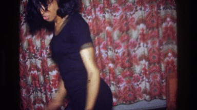 1975: young lady dances while playing a favorite record. BRONX NEW YORK