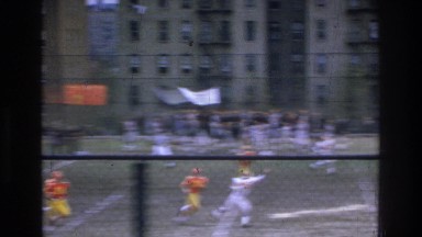 1975: people playing sports in a field. BRONX NEW YORK