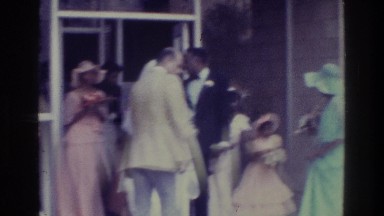 1975: the wedding party socializing. BRONX NEW YORK