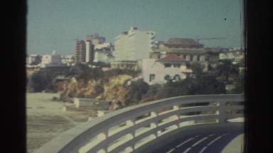 1976: Panning from Residential Skyline to Beach in Greece