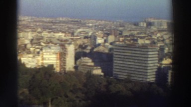 1976: Panoramic View of a Greek Cityscape with Traffic and Trees