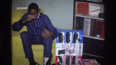 1975: a young black man inserting the lace of the shoe WASHINGTON DC