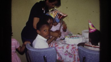 1976: a mother throwing a kids birthday party for her child HARLEM NEW YORK