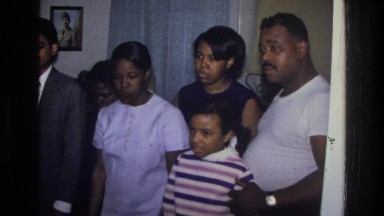 1976: members of an african-american family posing shyly before the camera