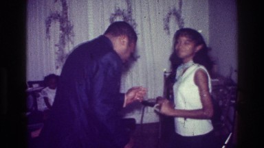 1976: family dancing in the living room. HARLEM NEW YORK