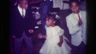 1976: a loving family dancing HARLEM NEW YORK