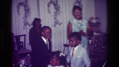 1976: african american family celebrating by dancing. HARLEM NEW YORK