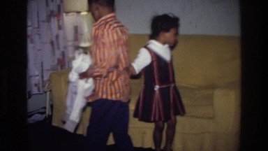 1976: little kids playing around in the living room. HARLEM NEW YORK