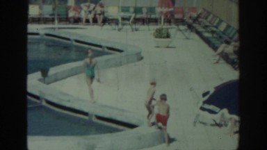 1962: Children Walking Around a Beachside Pool RHODES GREECE