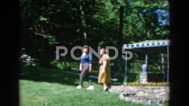 1962: Family Swimming and Splashing at Public Pool in Rhodes, Greece