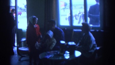 1963: Family Sitting with Children, Father Holding a Child, Small Girl Wearing Red
