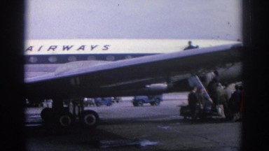 1963: Olympic Airways Airplane Being Boarded by Passengers Zurich Switzerland