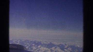 1963: high altitude footage of fluffy cloud cover from a plane ZURICH
