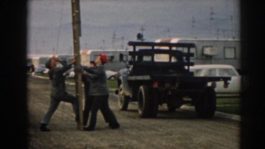 1962: men trying to put up a light pole. EPHESUS TURKEY