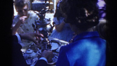 1962: children and adults are gathered around a samovar for hot drinks