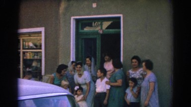 1962: family exits from a nice meal at a restaurant. IZMIR TURKEY