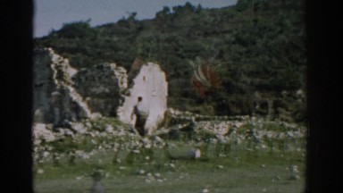 1962: man walking in a open area mountain view IZMIR TURKEY