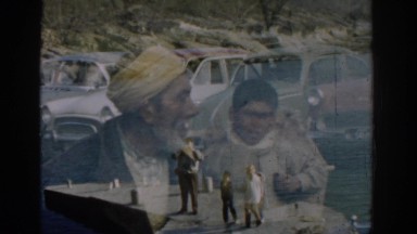 1962: a effects filled cars parked man with turban family at beach IZMIR TURKEY