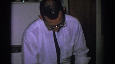 1962: Man Cutting the Turkey for Thanksgiving in Gary, Indiana