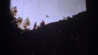 1962: a family standing upon a hill under the clear blue sky IZMIR TURKEY