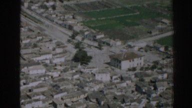 1962: view from a high area of a planted plain and a small village IZMIR TURKEY