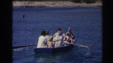 1962: a day out on the lake, some in a rowboat, others in a motorboat IZMIR