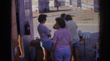 1962: women outside serving food. IZMIR TURKEY