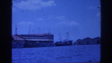 1962: vintage footage: panoramic view of a marina with high waters