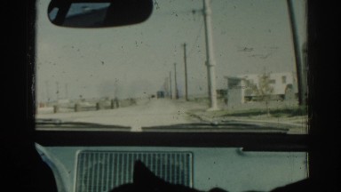 1962: slowing driving through a tiny town. IZMIR TURKEY