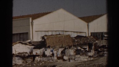 1962: two huge storage like structure of building maybe some working place too