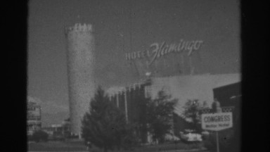 1962: huge signs on the side of the highway. LAS VEGAS