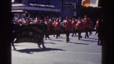 1962: a french flag followed by a huge parade with nice uniform NEW YORK CITY