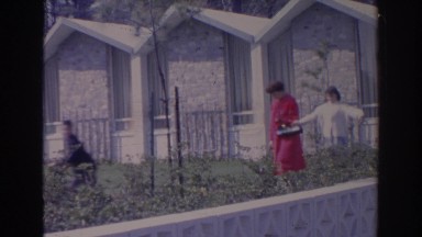 1966: people walking out in the garden. FLORIDA