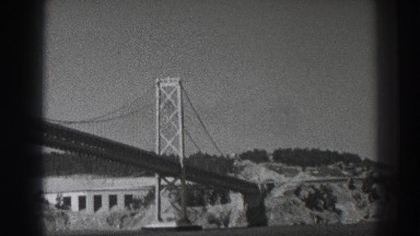 1937: old footage of bridge connecting land SAN FRANCISCO CALIFORNIA