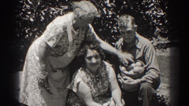 1937: family counting the eggs they just gathered. LONG BEACH CALIFORNIA