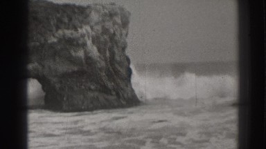 1937: natural bridge with tide rolling in SANTA CRUZ CALIFORNIA