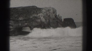 1937: waves crash on rocks SANTA CRUZ CALIFORNIA