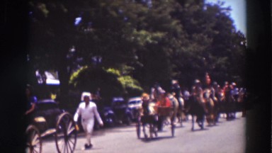 1937: a small parade going through town. TRUCKEE CALIFORNIA