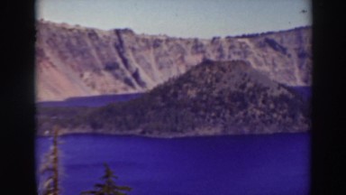 1937: view point of hills and water dam CRATER LAKE OREGON