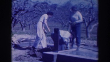 1937: People Building a Foundation to Store Delicious Fruit
