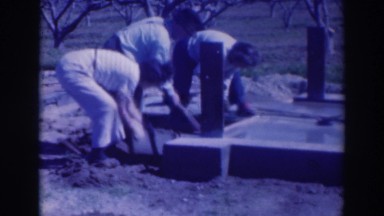 1937: a group of workers doing some work on wood with drillers SACRAMENTO