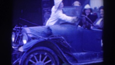 1937: wiping off the windshield of the car. SACRAMENTO CALIFORNIA