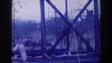 1937: some men working with large tower made of steel in the daytime SACRAMENTO