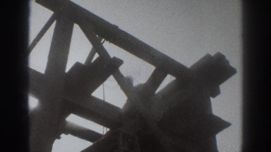 1937: a workman constructing a wooden tower SACRAMENTO CALIFORNIA