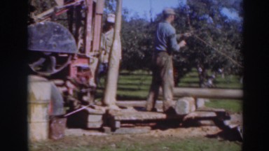 1937: a man works on a machine outside SACRAMENTO CALIFORNIA