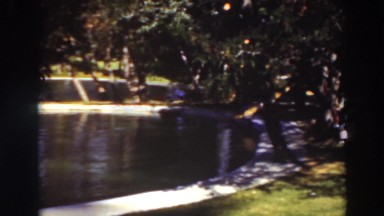 1937: person sitting by a pond VIRGINIA CITY CALIFORNIA