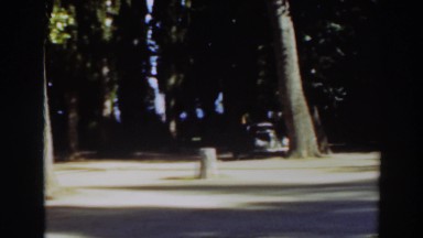 1937: panorama of charming, rustic campground parking lot