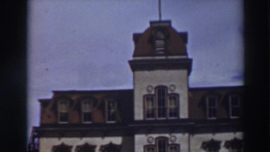 1937: tall, prestigious building standing alone. VIRGINIA CITY CALIFORNIA