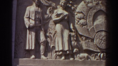 1939: a stone sculpture carved on the side of a building NEW YORK WORLDS FAIR