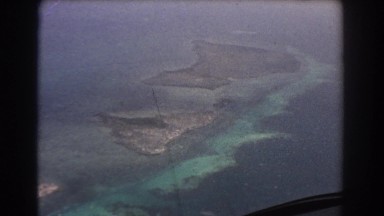 1967: aerial view of a small chain of islands. PERTH AUSTRALIA